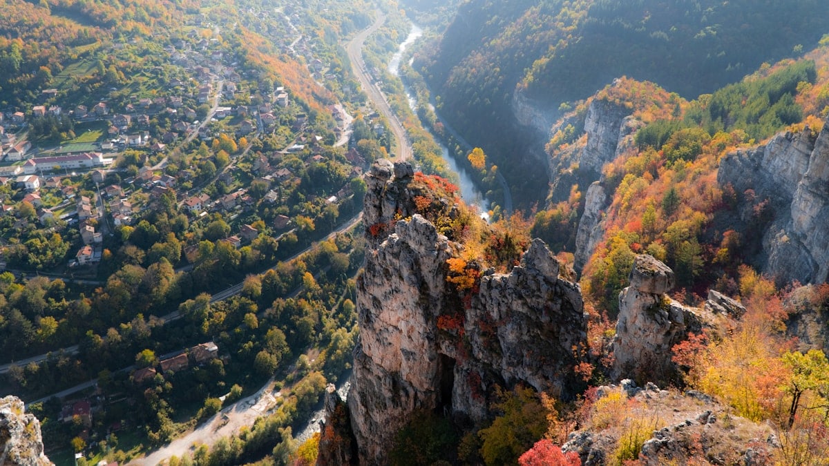 a winding road through a valley